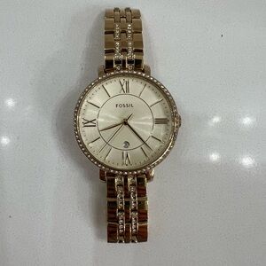 Gold Fossil watch